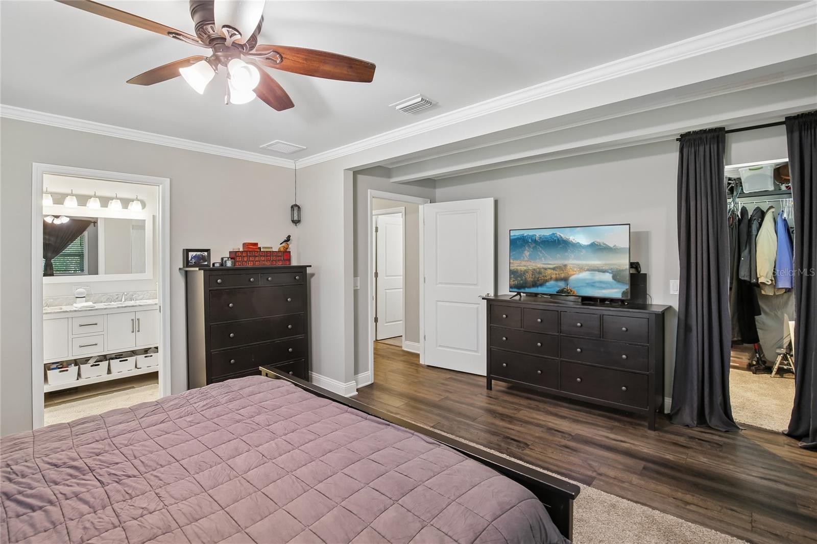 Primary Bedroom Closet & Bath View – The primary bedroom features generous storage with a closet area and convenient access to the en suite bathroom. The open layout provides room for multiple furniture arrangements.Primary Bedroom Closet & Bath View – The primary bedroom features generous storage with a closet area and convenient access to the en suite bathroom. The open layout provides room for multiple furniture arrangements.