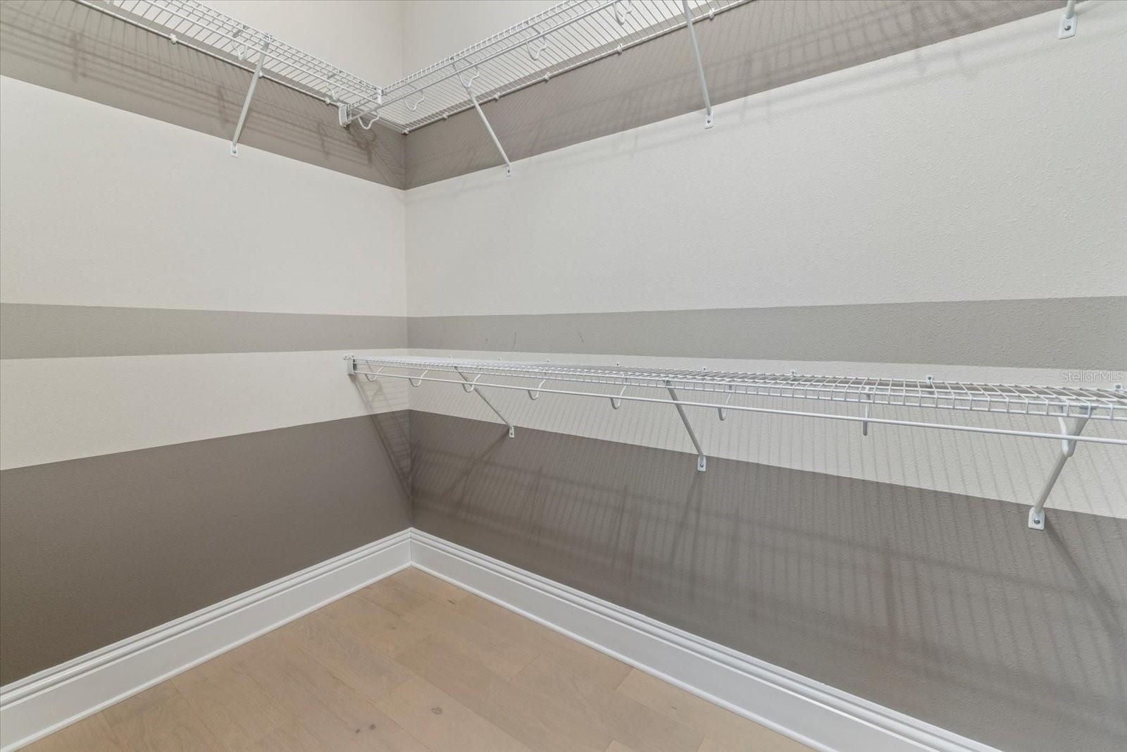 Primary His/Hers Walk-in closets - 2