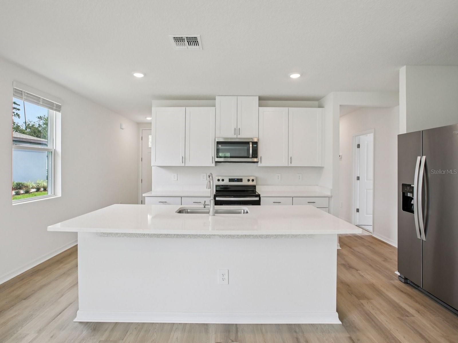 Interior photos are not of the actual home but are photos of the builder home with the same floorplan with similar interior finishes and features.