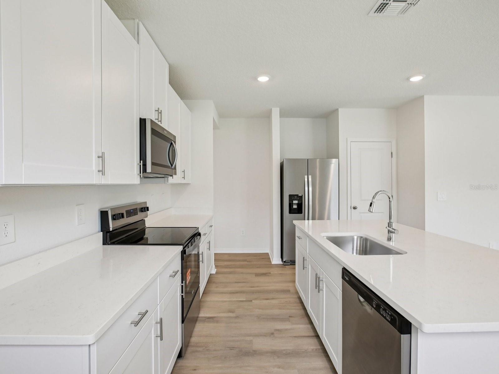 Interior photos are not of the actual home but are photos of the builder home with the same floorplan with similar interior finishes and features.