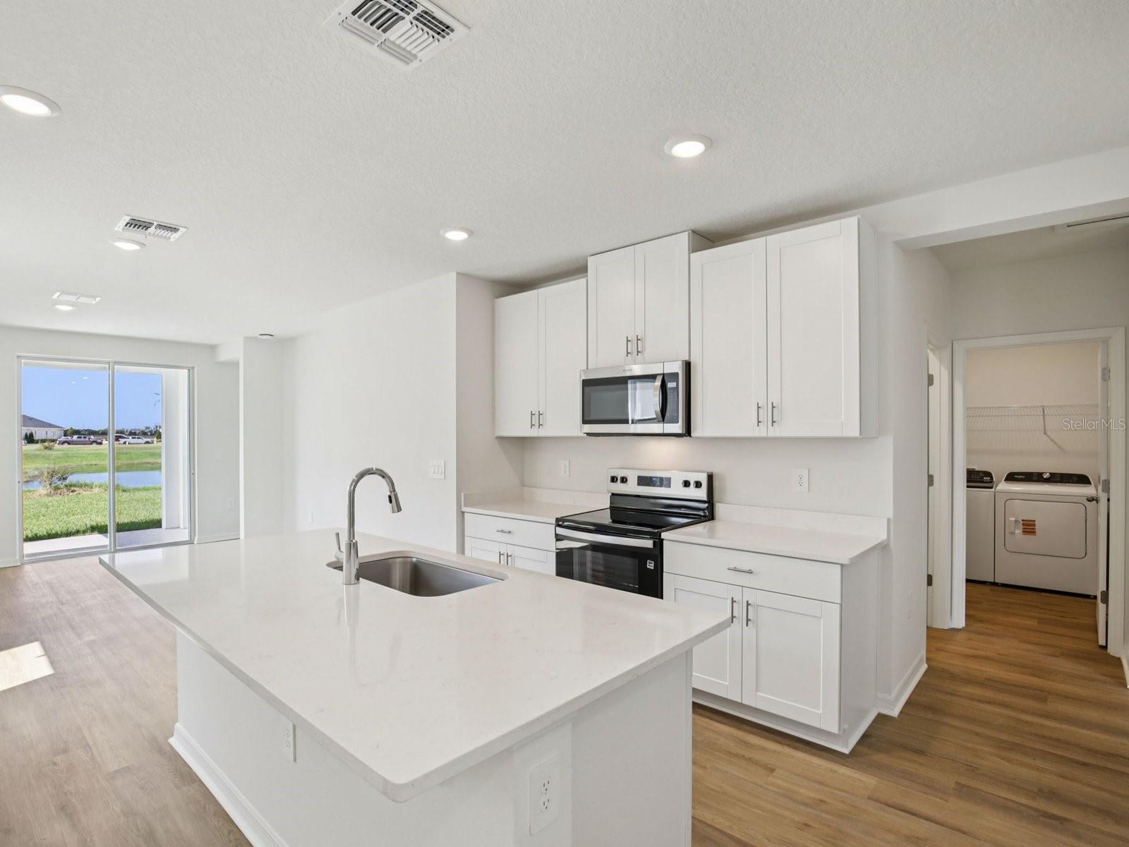 Interior photos are not of the actual home but are photos of the builder home with the same floorplan with similar interior finishes and features.