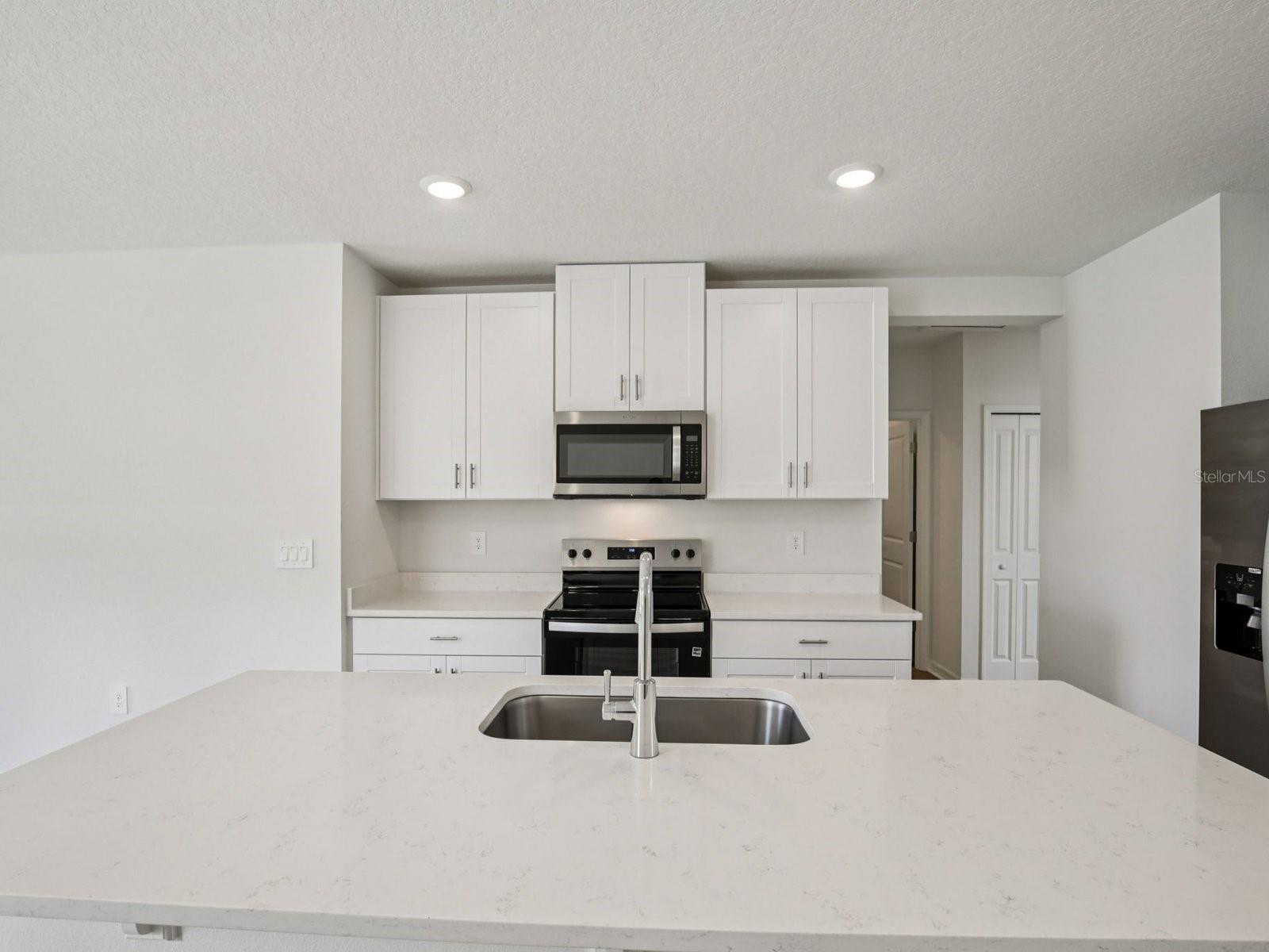 Interior photos are not of the actual home but are photos of the builder home with the same floorplan with similar interior finishes and features.