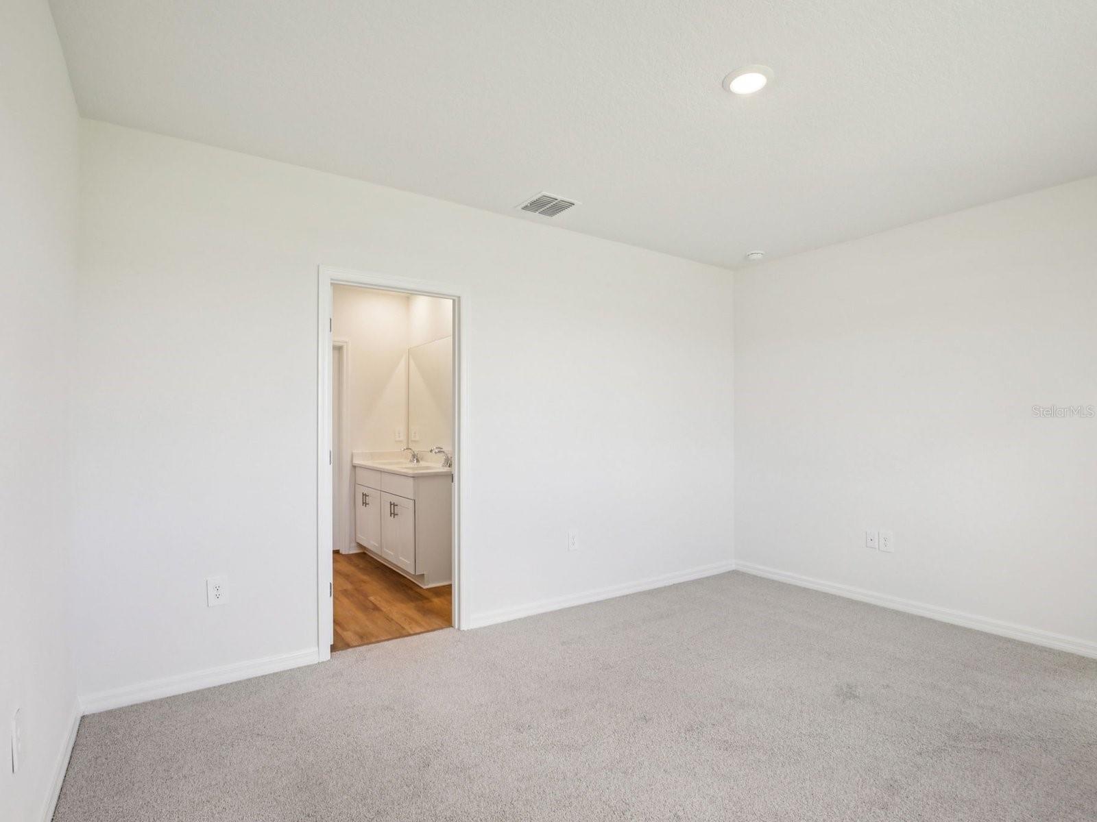Interior photos are not of the actual home but are photos of the builder home with the same floorplan with similar interior finishes and features.