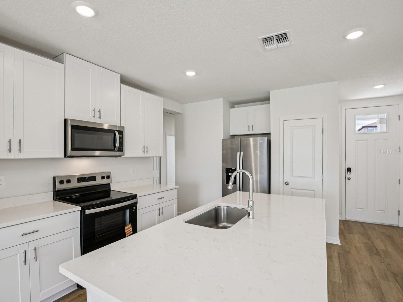 Interior photos are not of the actual home but are photos of the builder home with the same floorplan with similar interior finishes and features.