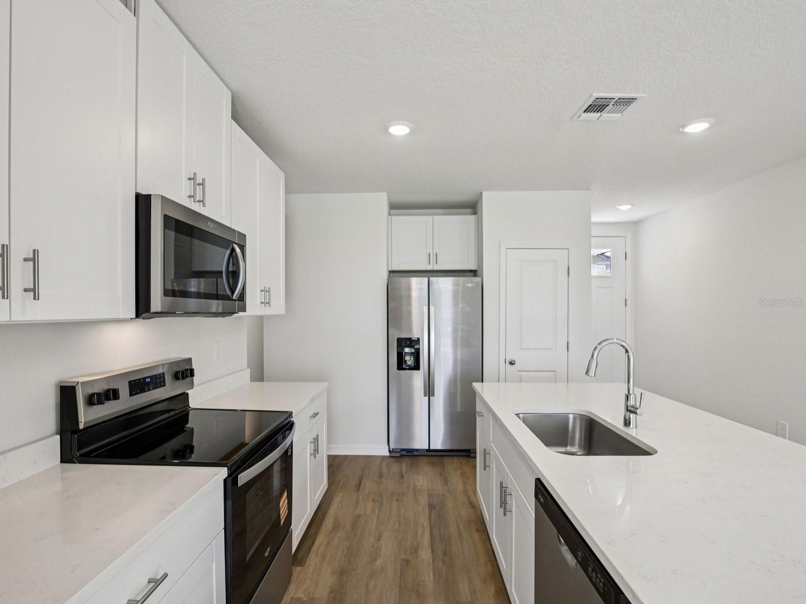 Interior photos are not of the actual home but are photos of the builder home with the same floorplan with similar interior finishes and features.