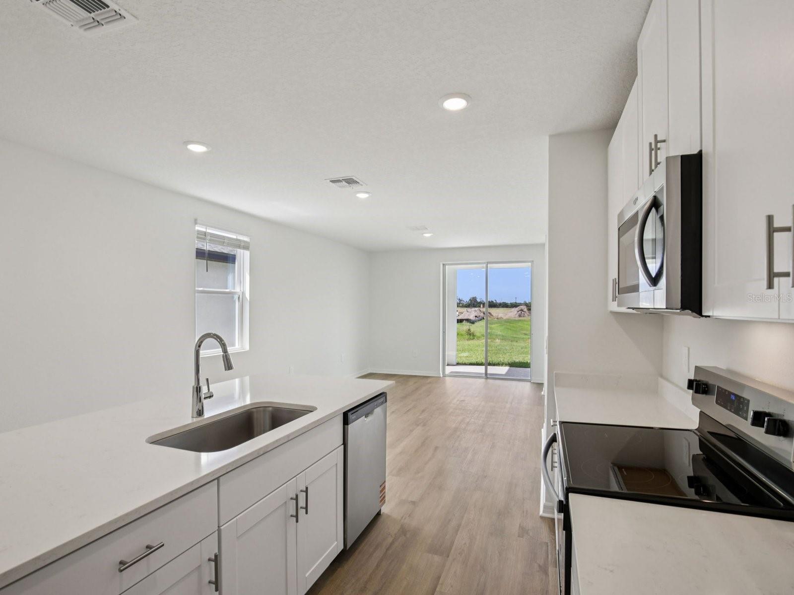 Interior photos are not of the actual home but are photos of the builder home with the same floorplan with similar interior finishes and features.