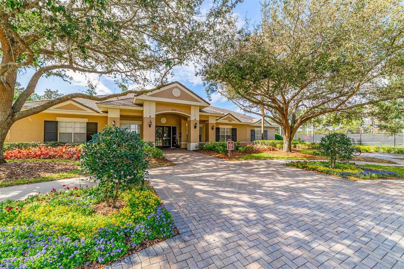 The Osprey Club with fitness room, pool, play ground & sports courts