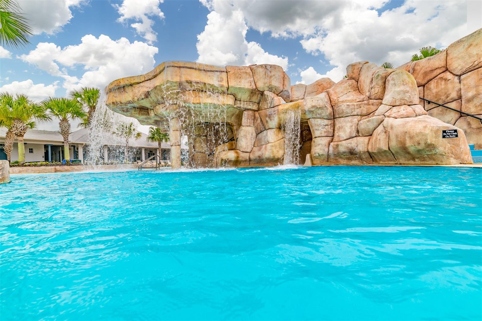 The Aquatic Club with fitness room, water slide, lap pool & playground