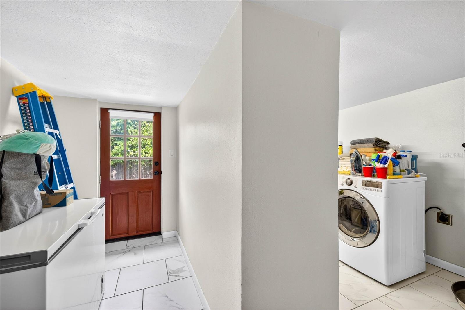 Laundry room near rear of property