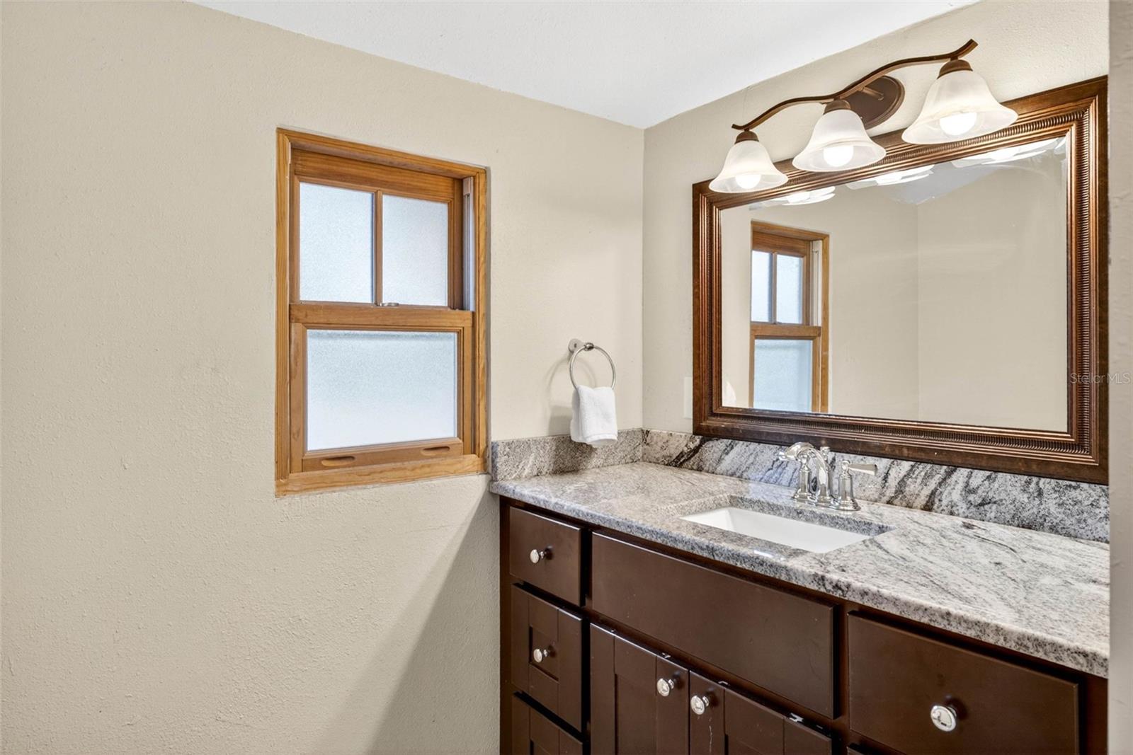 Extra wide single vanity in master bathroom
