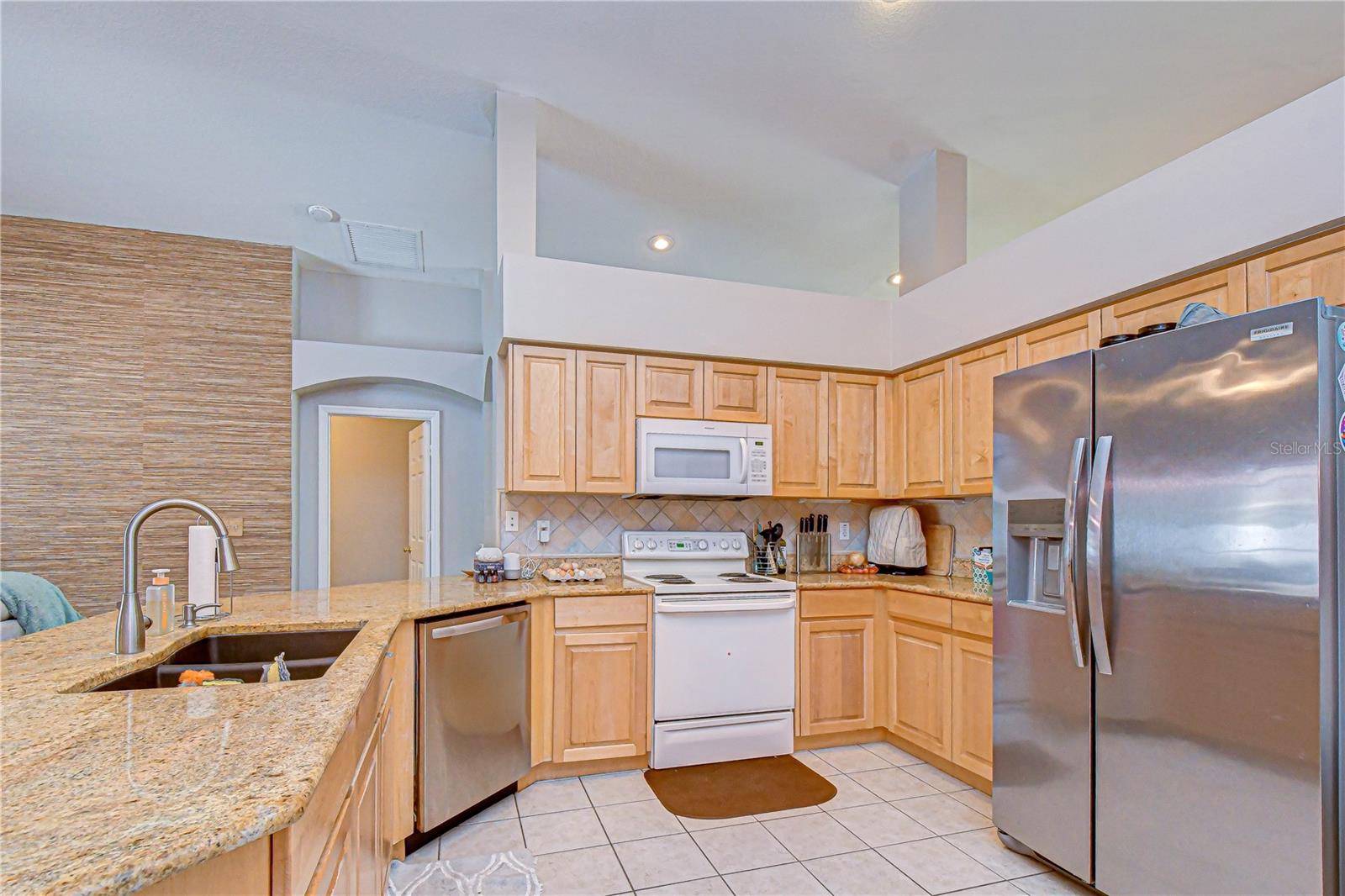 Centrally located kitchen designed for functionality