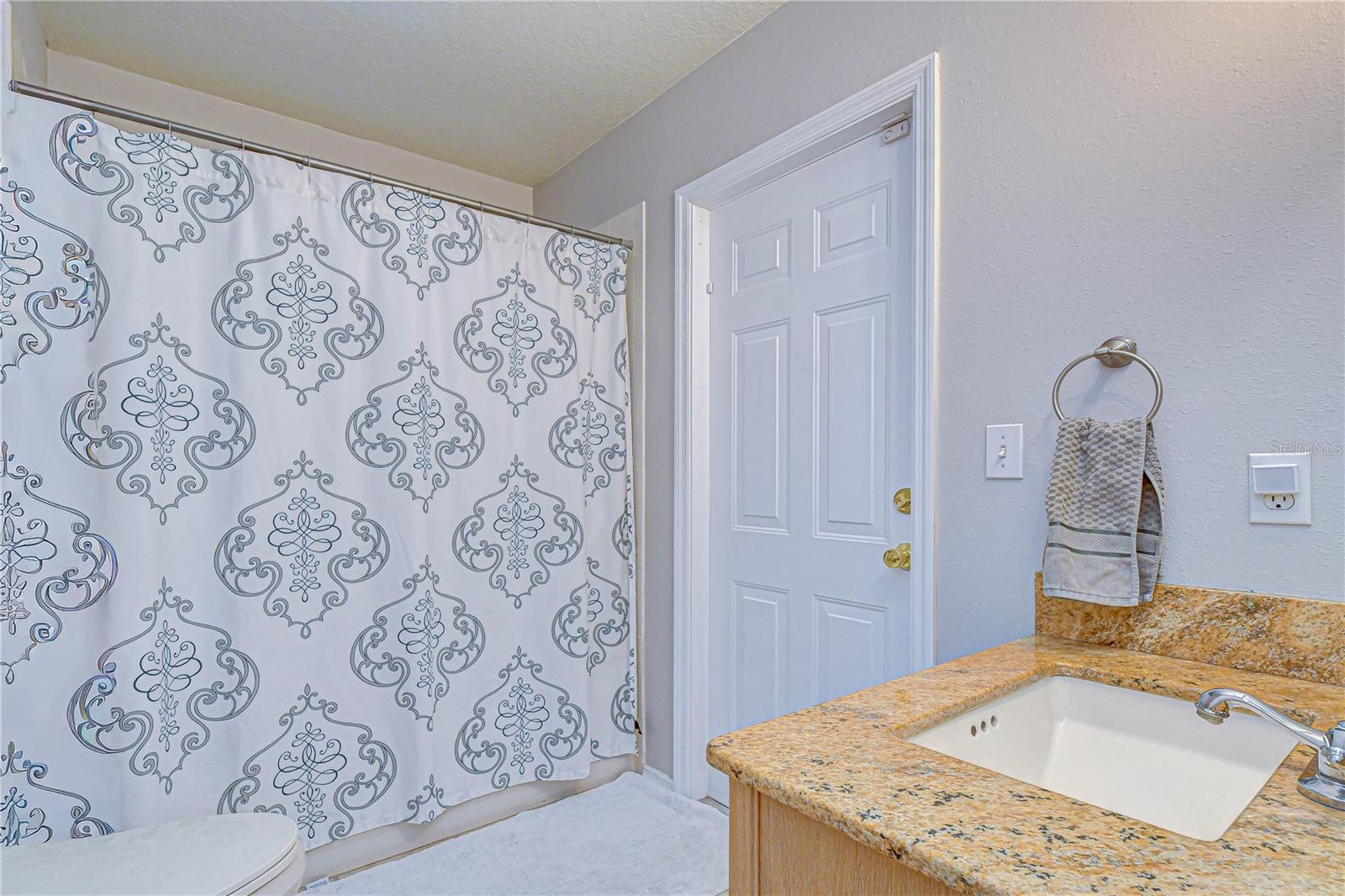 Well-appointed full bath serving secondary bedrooms
