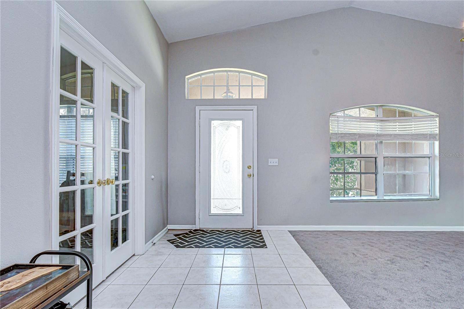 Welcoming entry opening into spacious living areas