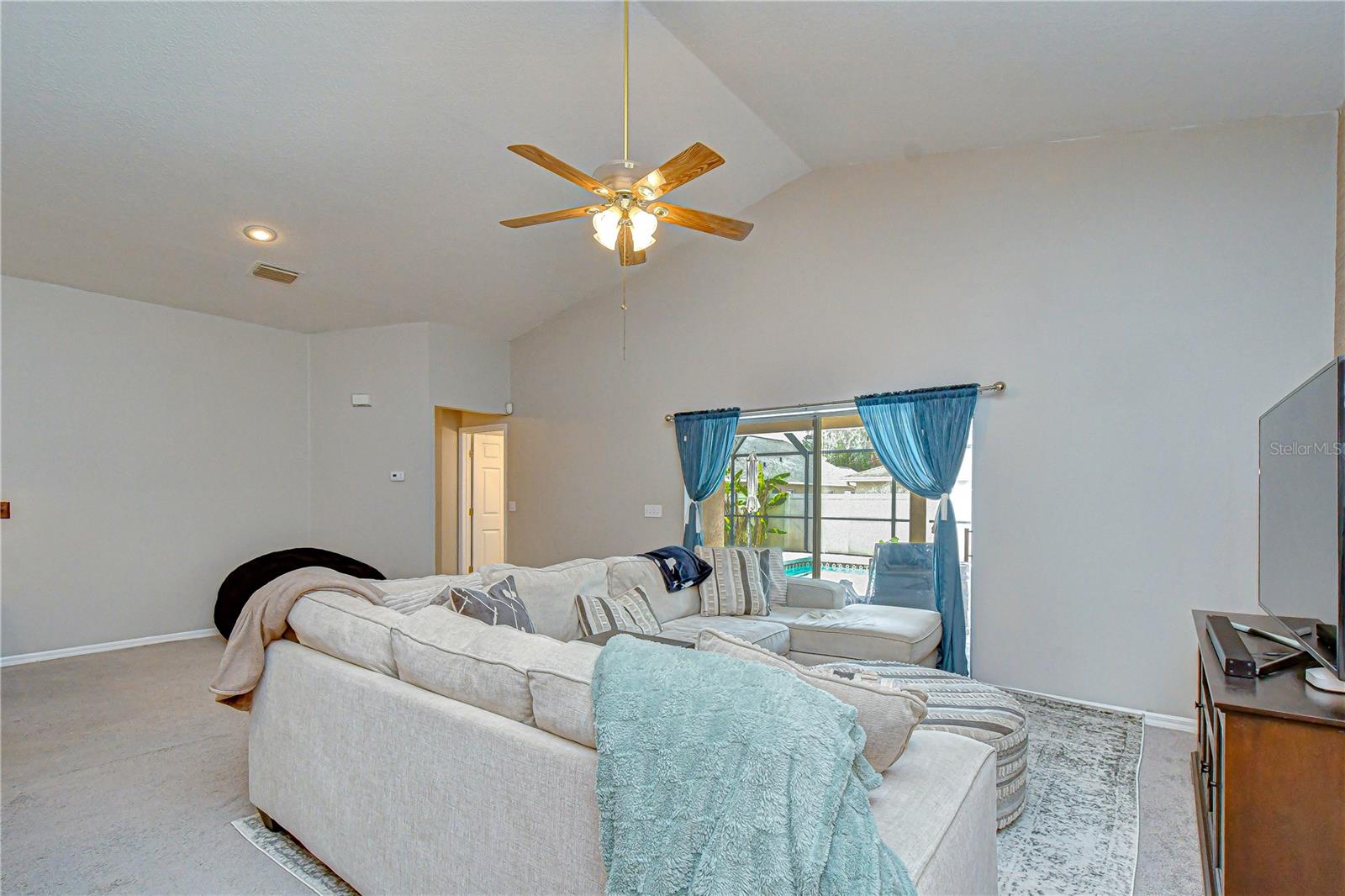 Comfortable gathering space overlooking pool area