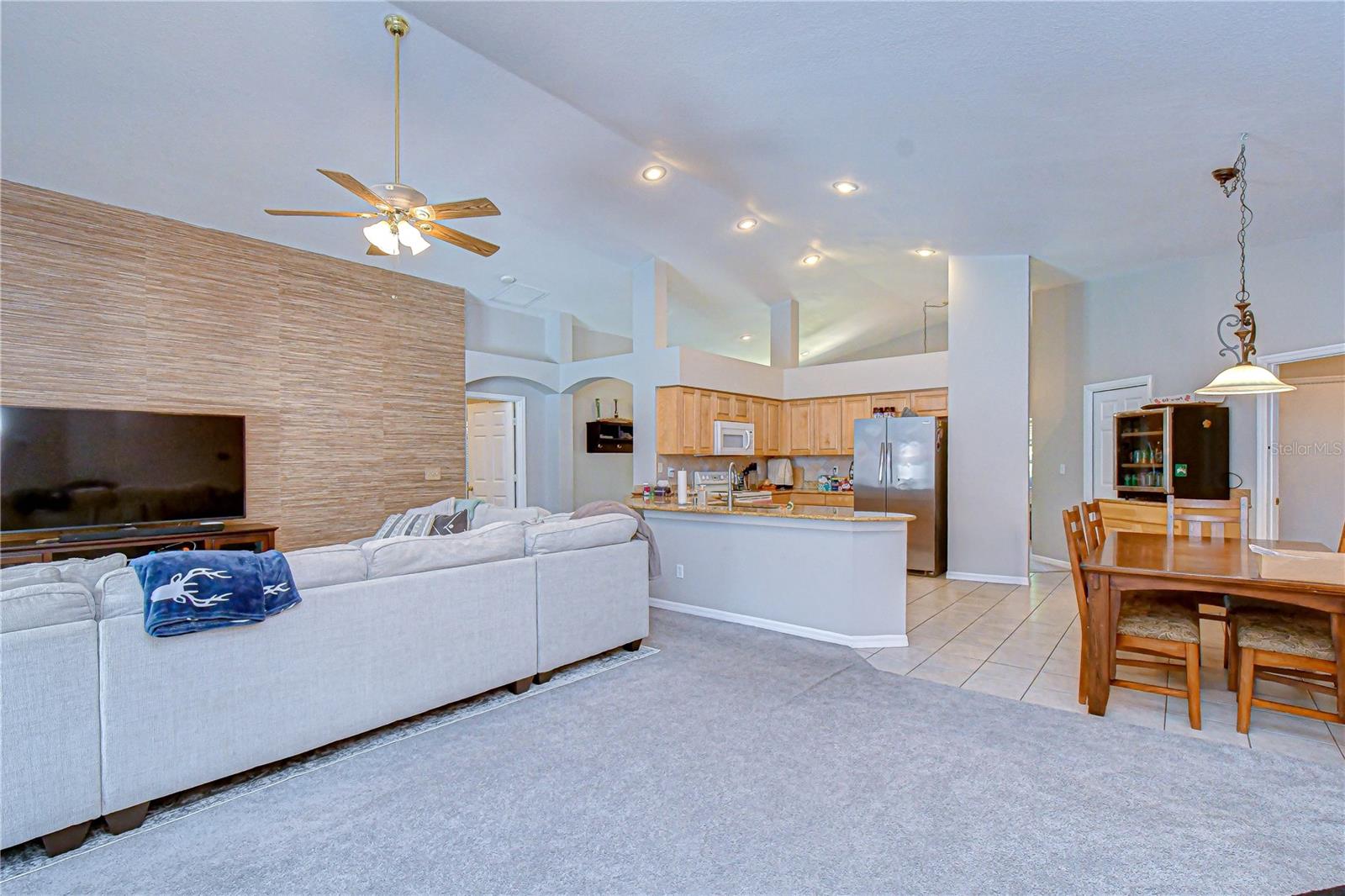Seamless flow to dining and kitchen.
