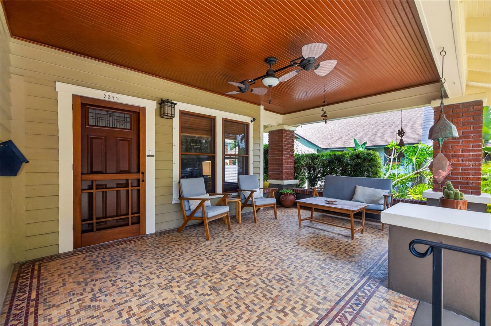 Oversized Covered Front Porch with Dual Fan and Original Tile Flooring