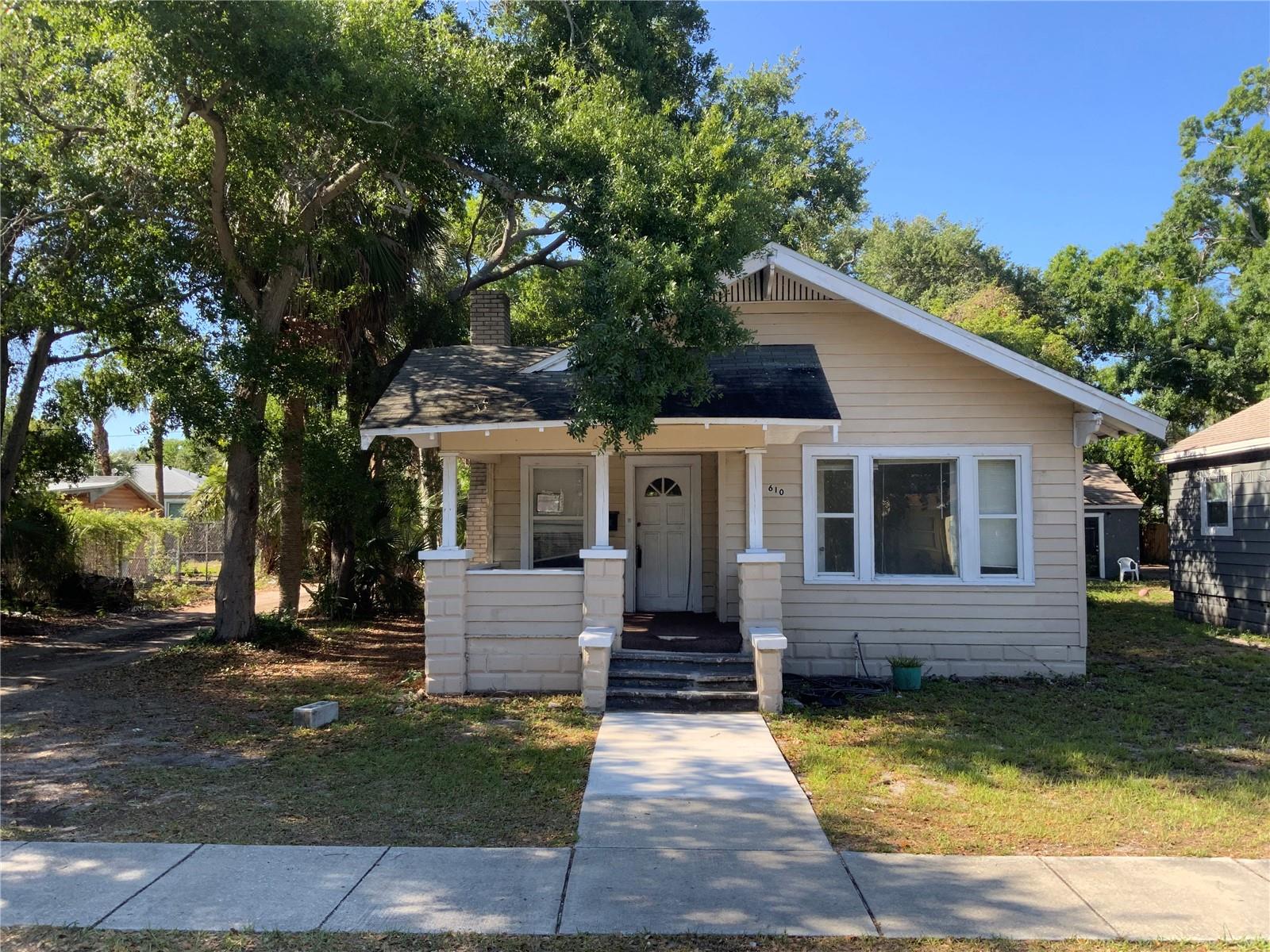 Home with Side Alley Access