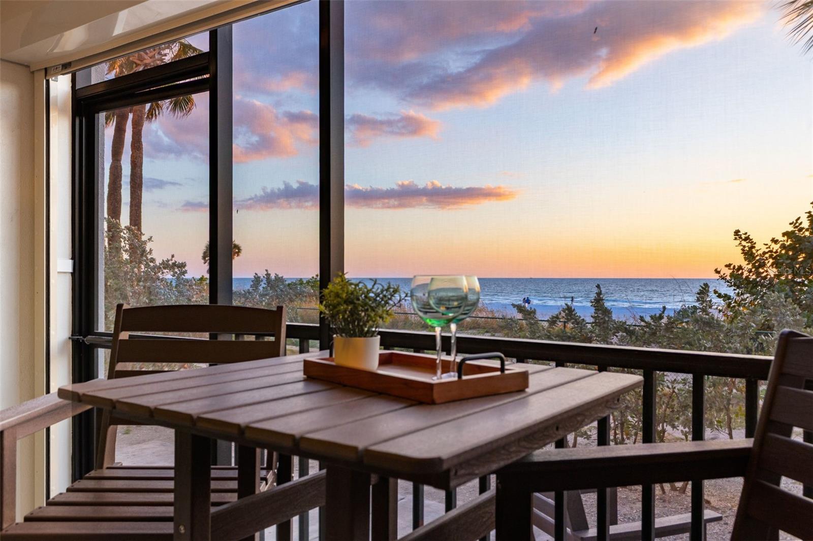 Sunsets on your screened in lanai mere steps to the beach...