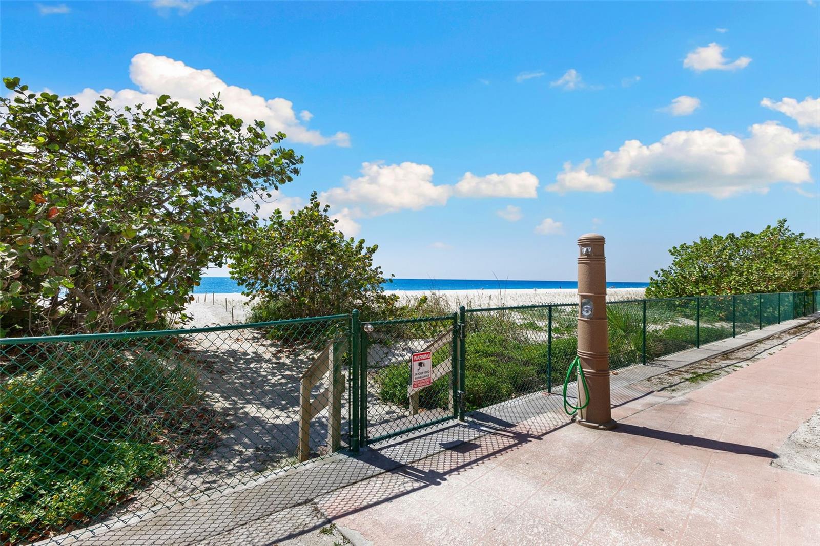 Outdoor Shower next to private Reflections beach access