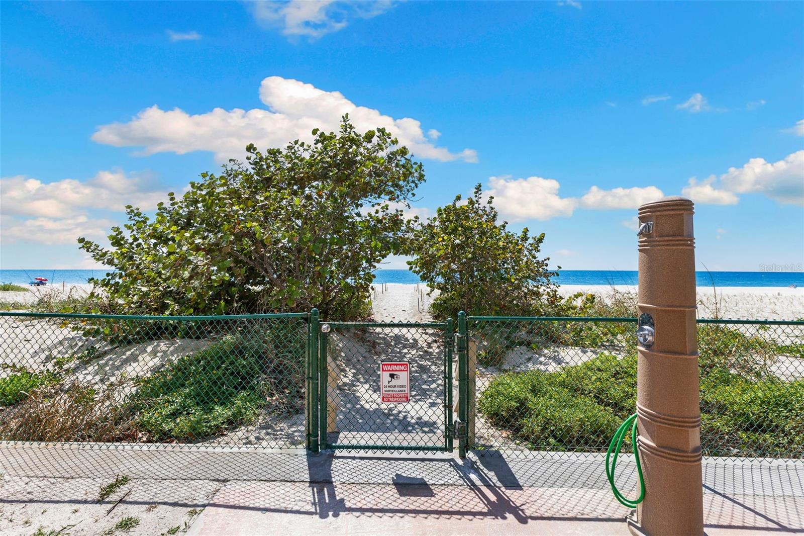 You are the closest unit to direct, private beach access! Outdoor shower to rinse off right before heading home.