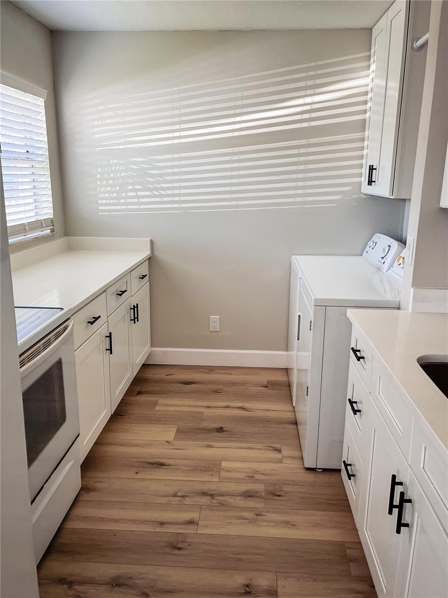 Kitchen features new cabinets.