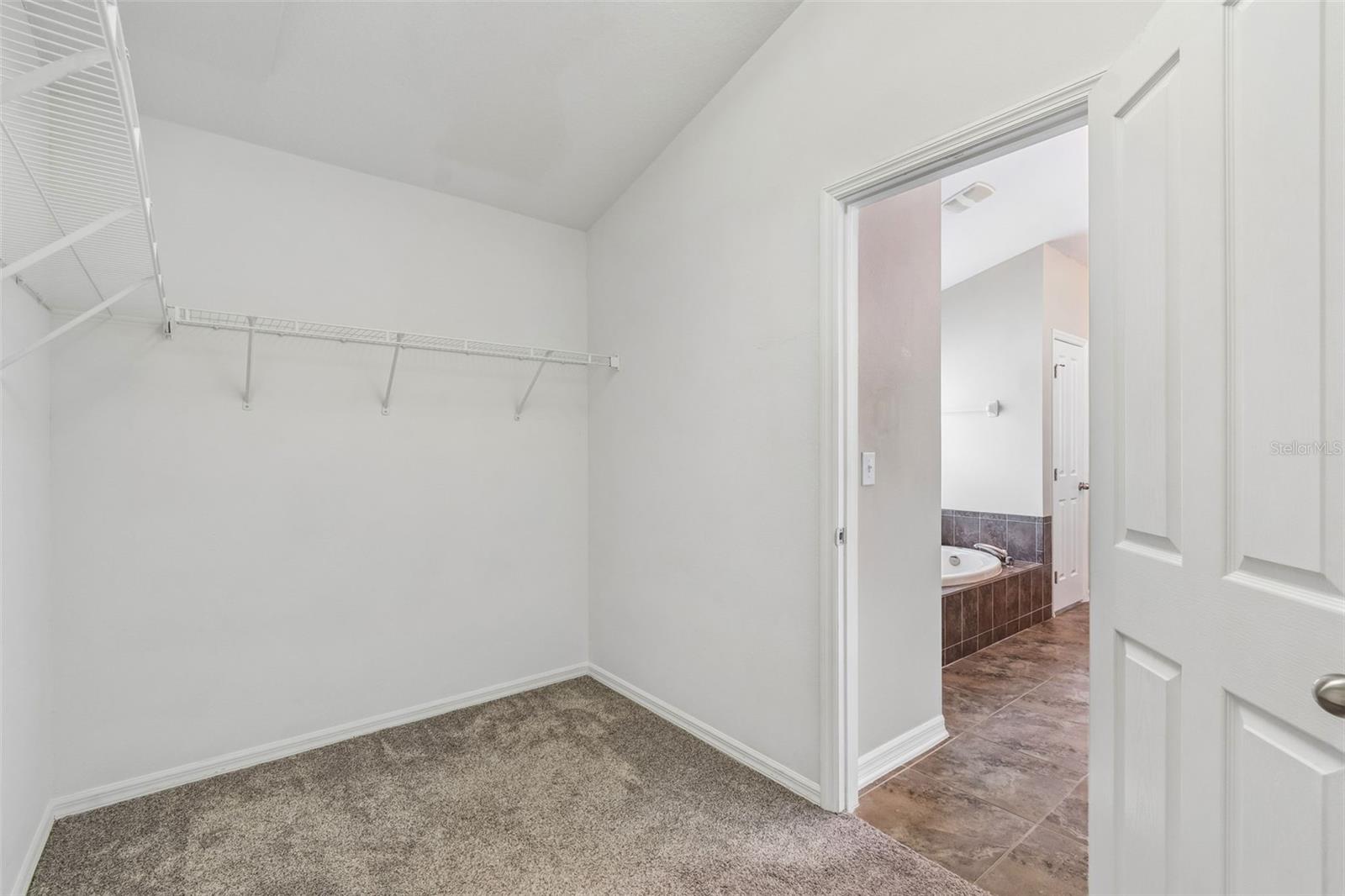 Primary walk-in closet