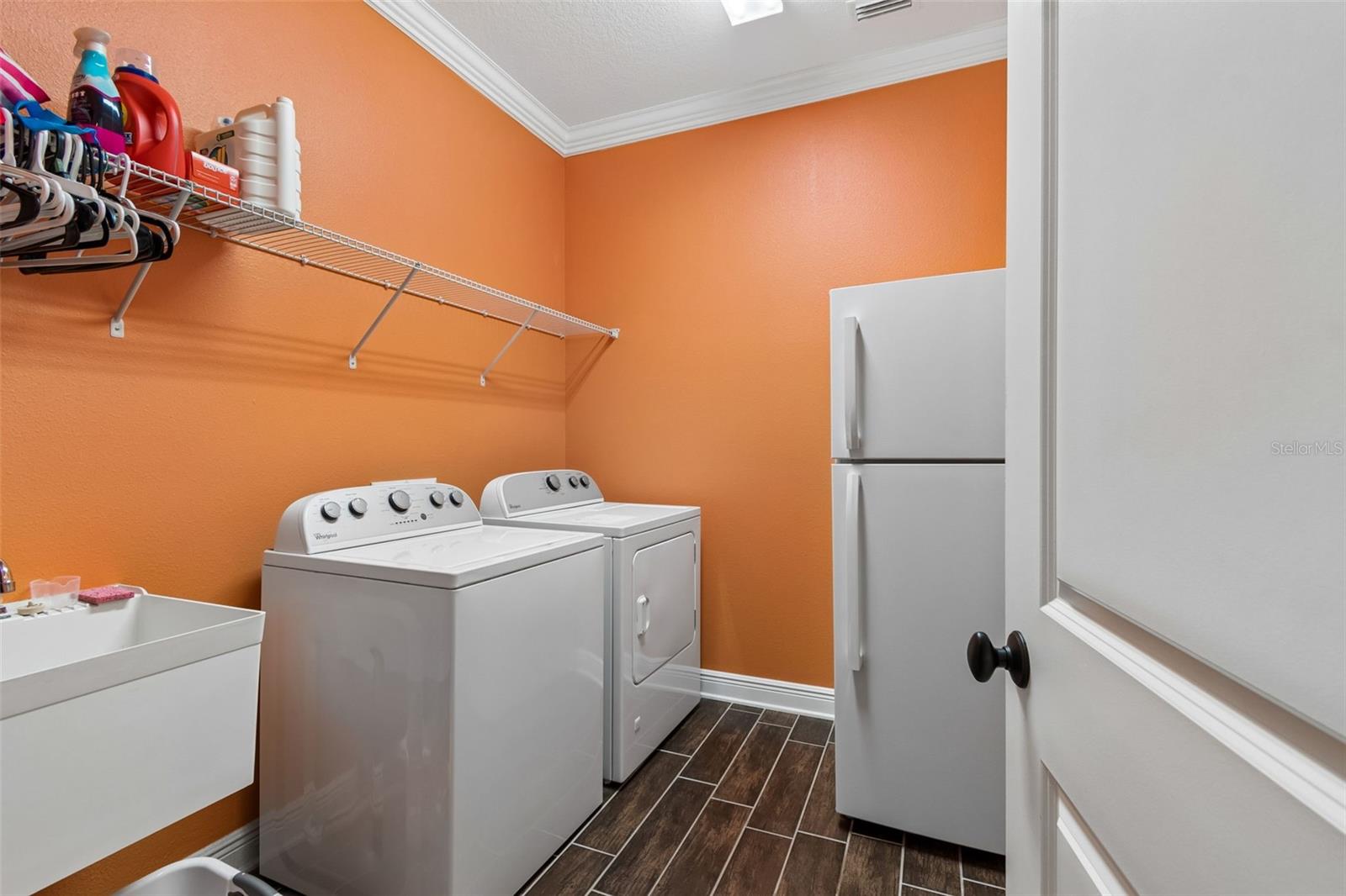 Separate Laundry Room.