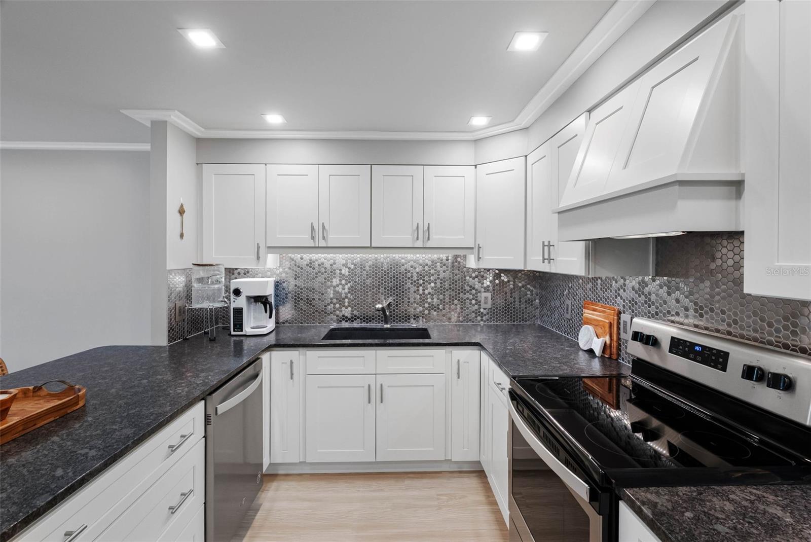 Granite, sparkling backsplash