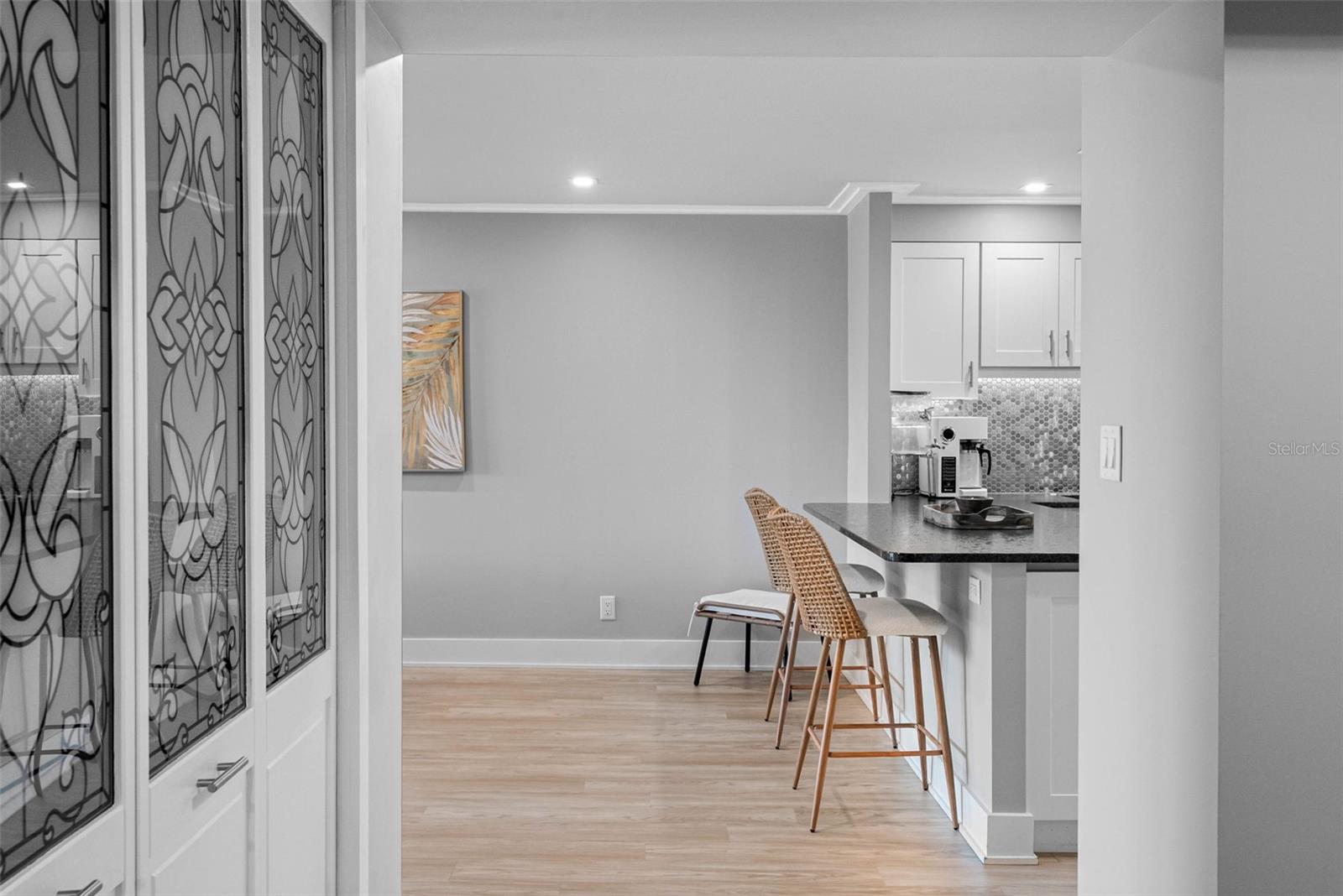 Foyer to kitchen, living & dining