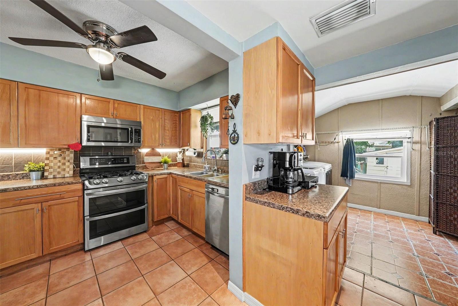 Kitchen with Laundry and storage to the back of house