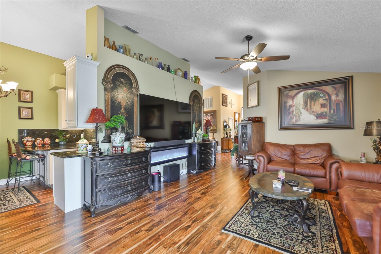 Living Room, Electric Wall Fireplace, Beautiful Acacia Flooring