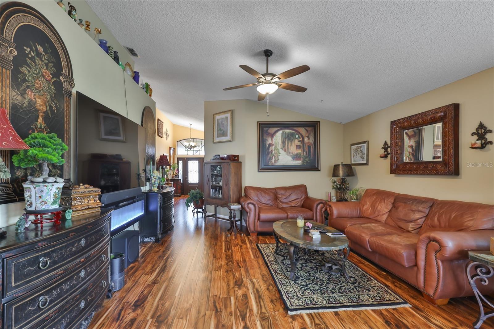 Living Room, Electric Wall Fireplace, Beautiful Acacia Flooring