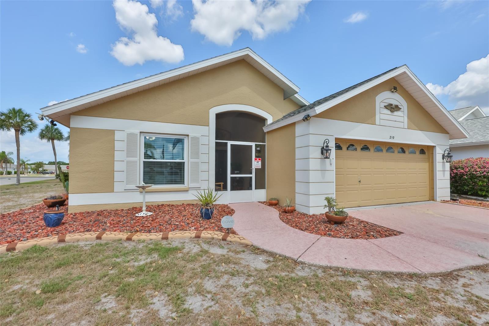 Exterior Front, Large Corner Lot, Concrete Curbing, Painted Drive & Walkway