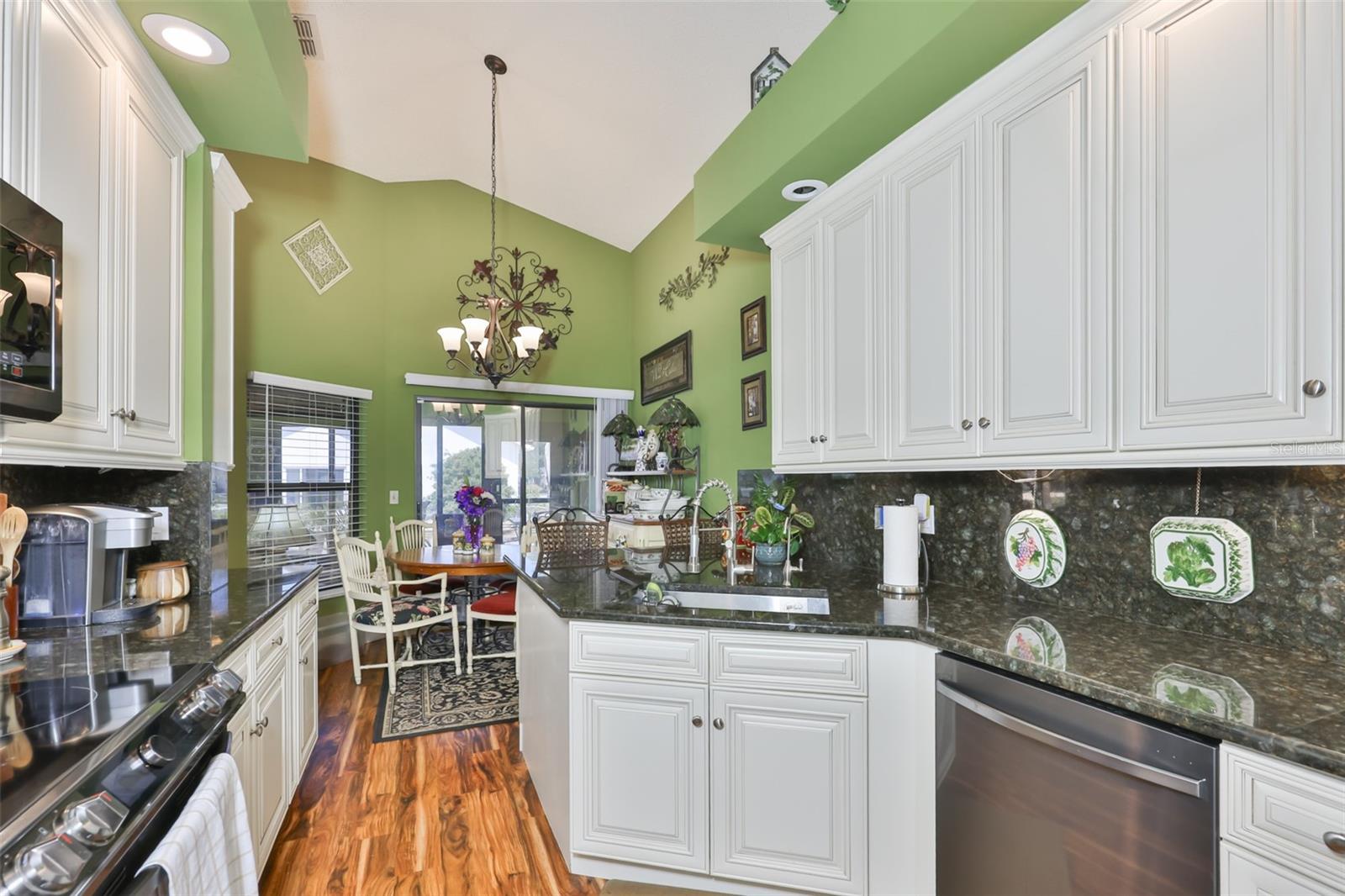 Cabinets, SS Appliances Acacia Flooring