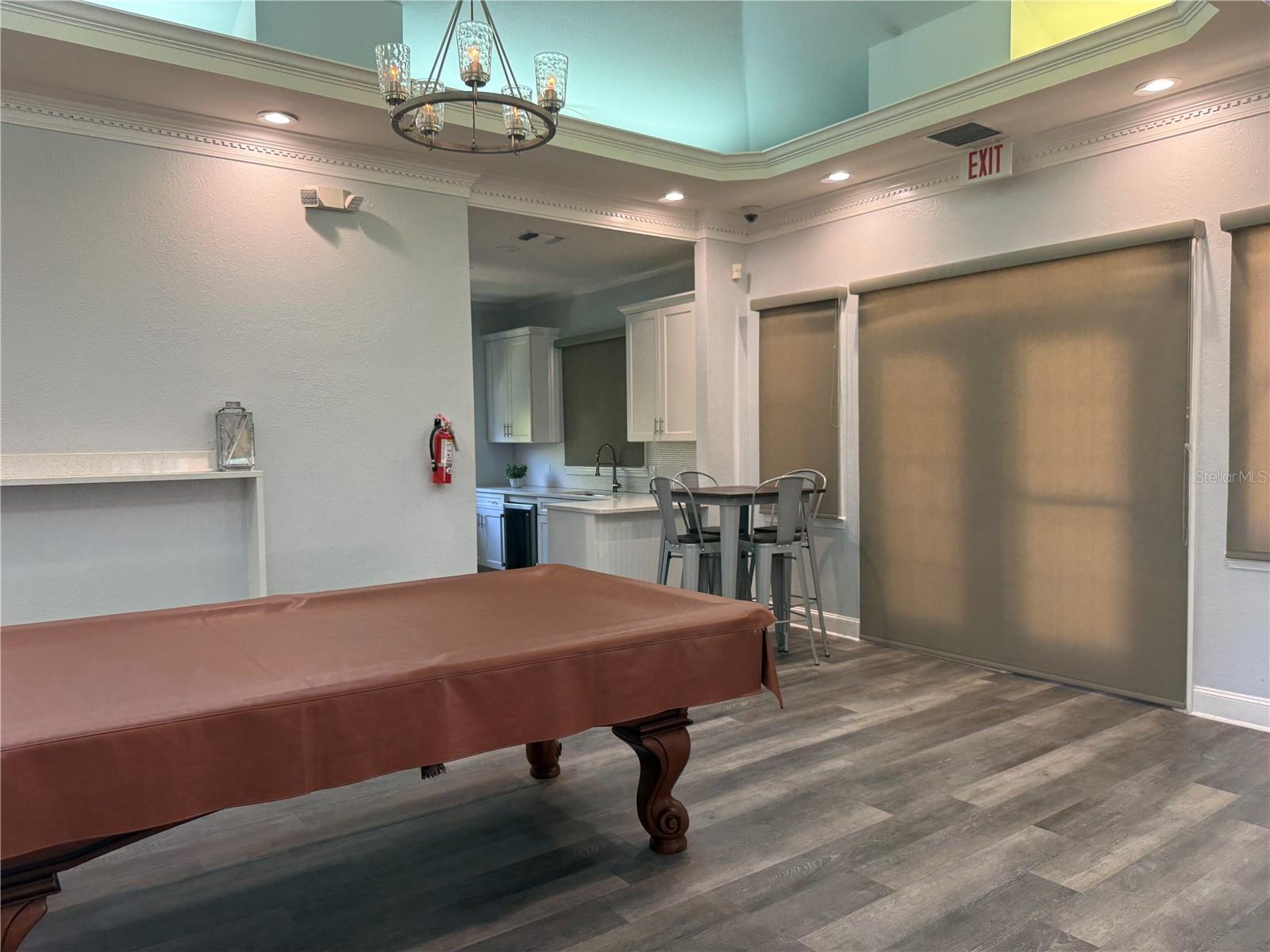 Community billiards room and full kitchen for hosting large gatherings