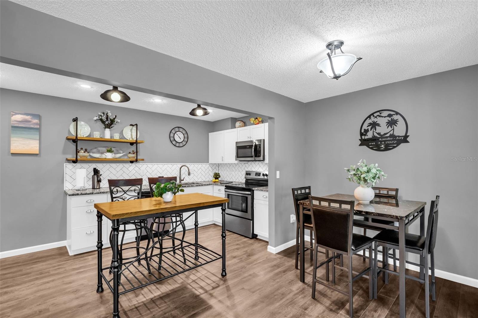 Stunning kitchen updates with eat-in kitchen space & separate formal dining~