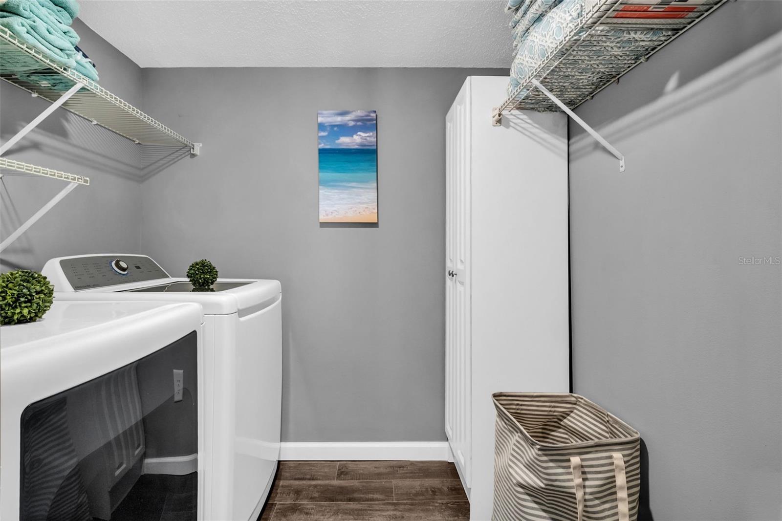 Large indoor laundry & additional storage space~