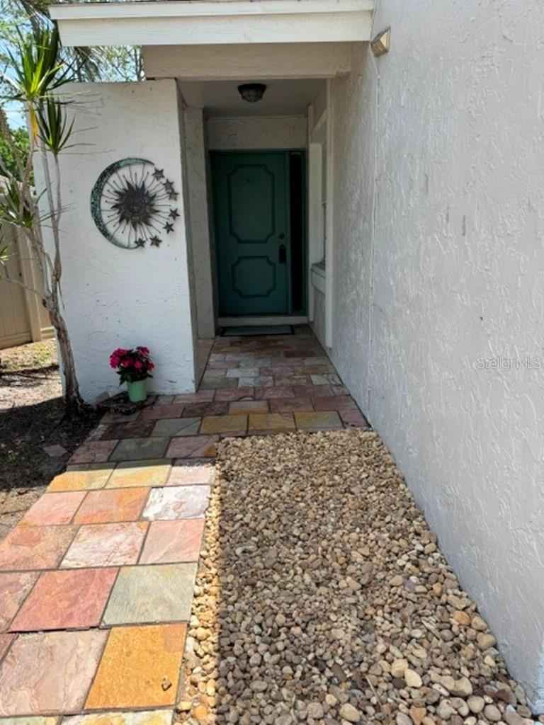 Front entrance to side of home