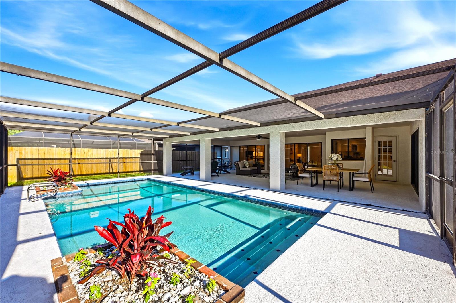 Sparkling pool with HUGE outdoor covered space