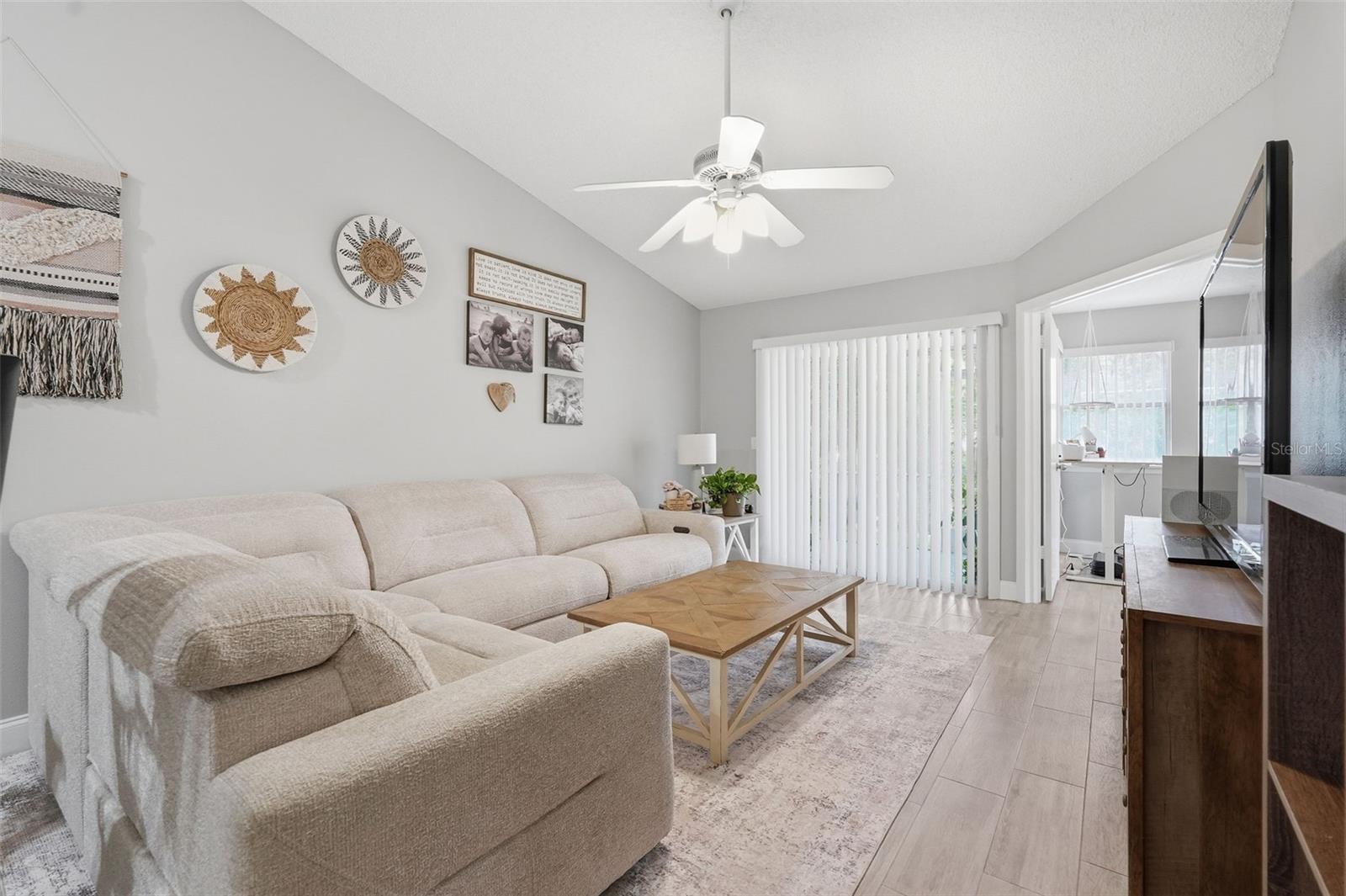 Family room. French doors to the primary bedroom.