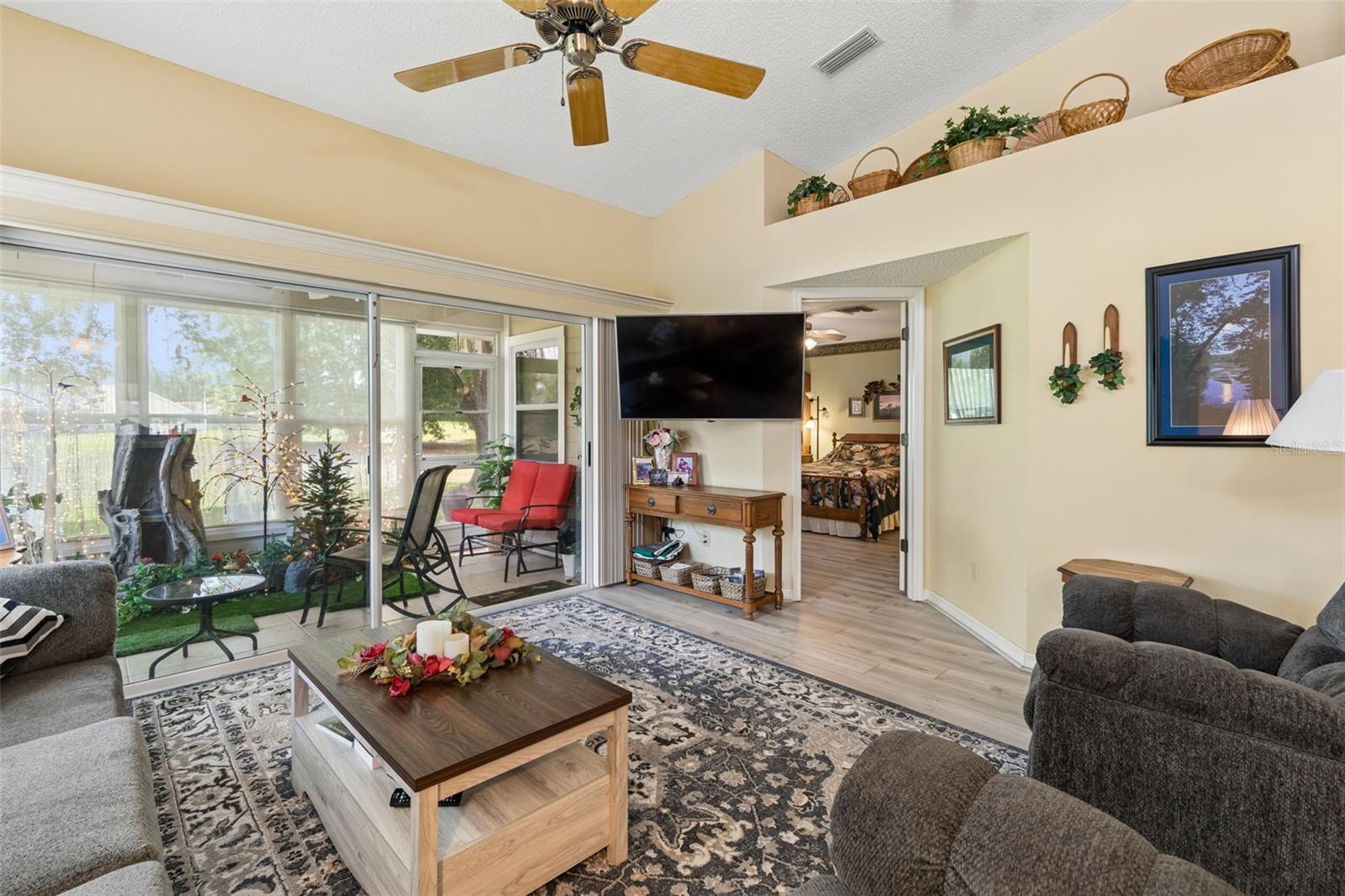Living room with view of Primary Bedroom