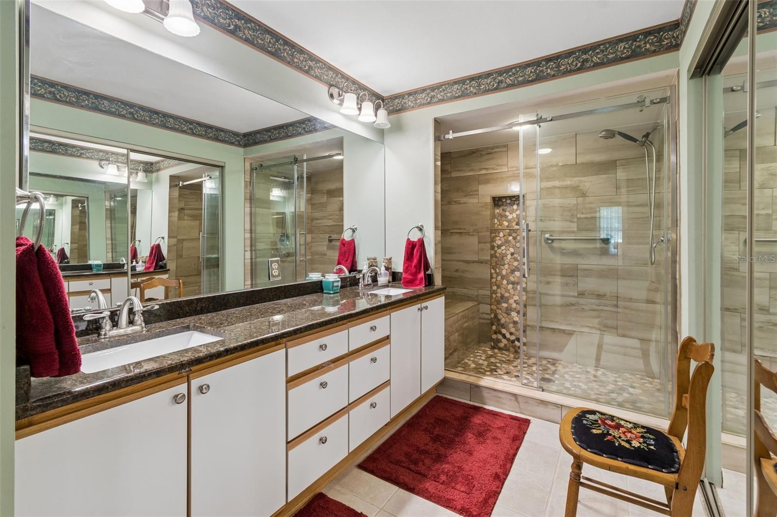 Primary bathroom with updated shower