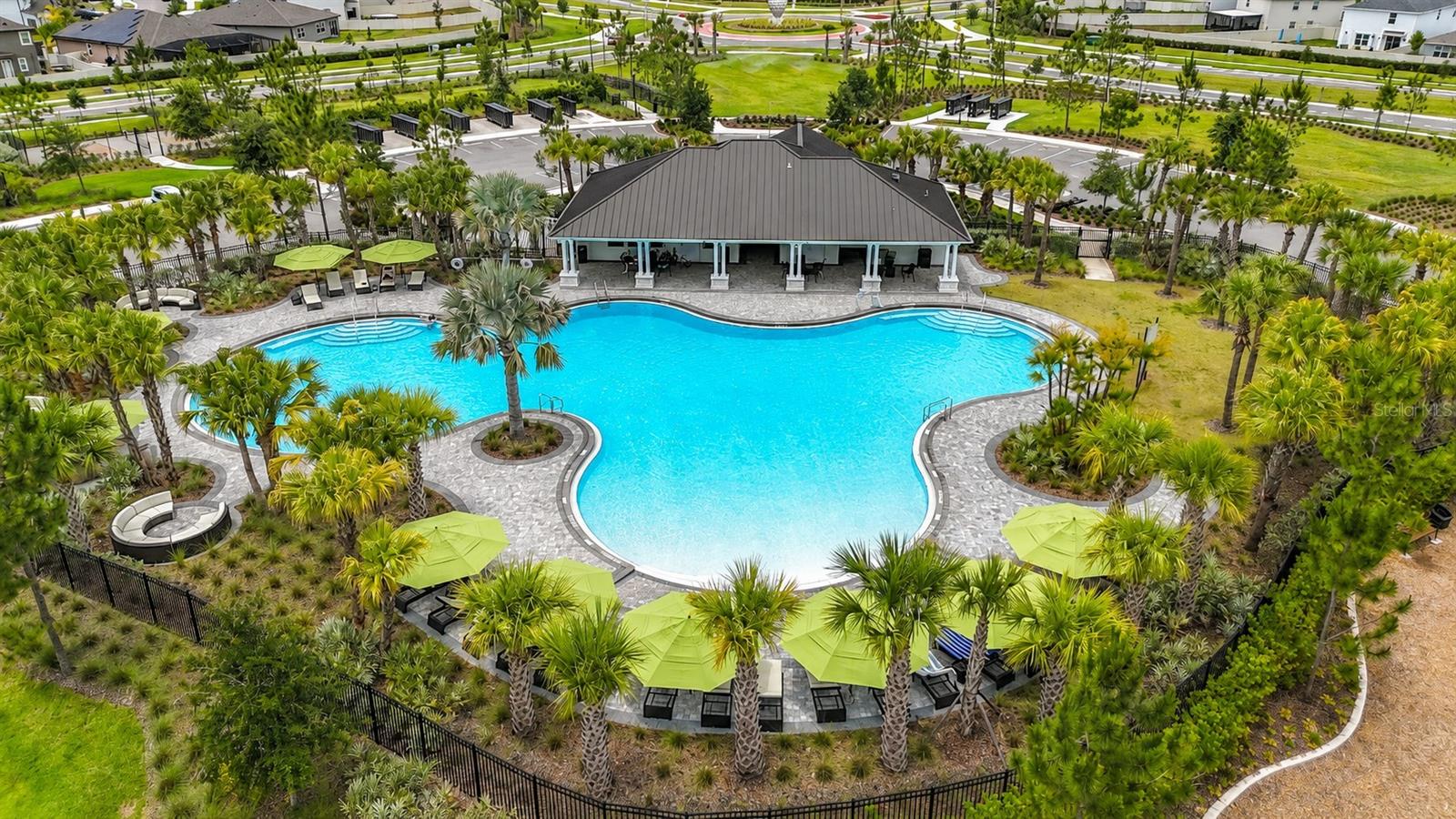 Berry Bay's resort-style amenities include a zero-entry pool, clubhouse, picnic areas, dog park, playground, basketball courts, and pickleball courts.