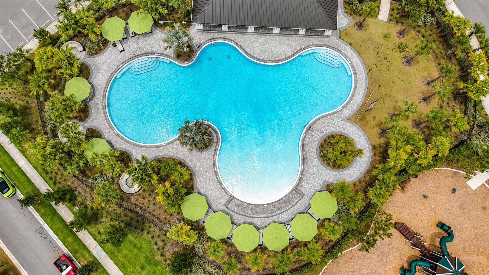 Berry Bay's resort-style amenities include a zero-entry pool, clubhouse, picnic areas, dog park, playground, basketball courts, and pickleball courts.