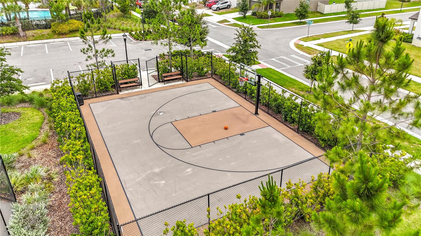Berry Bay's resort-style amenities include a zero-entry pool, clubhouse, picnic areas, dog park, playground, basketball courts, and pickleball courts.