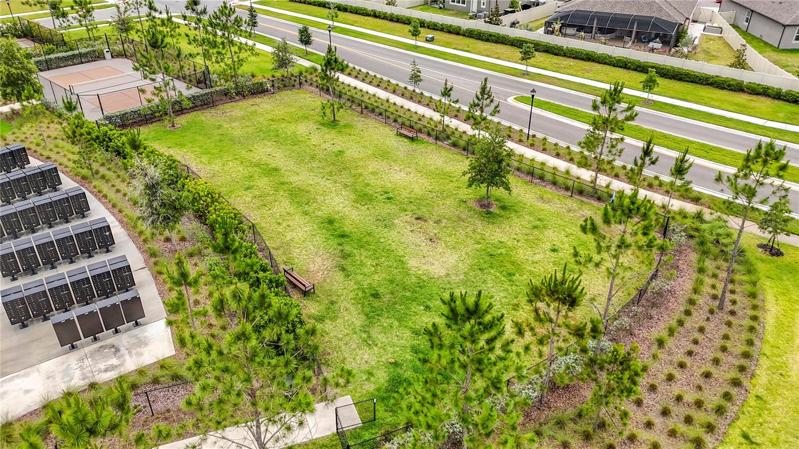 Berry Bay's resort-style amenities include a zero-entry pool, clubhouse, picnic areas, dog park, playground, basketball courts, and pickleball courts.