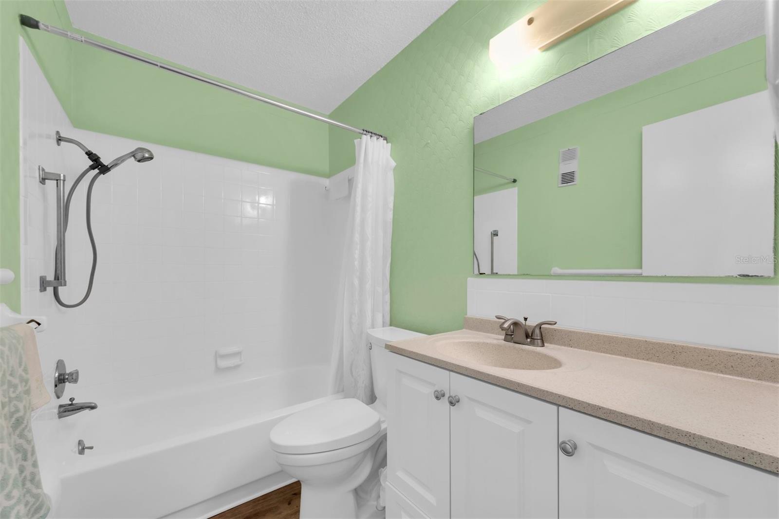 Guest bathroom; newly glazed bathtub