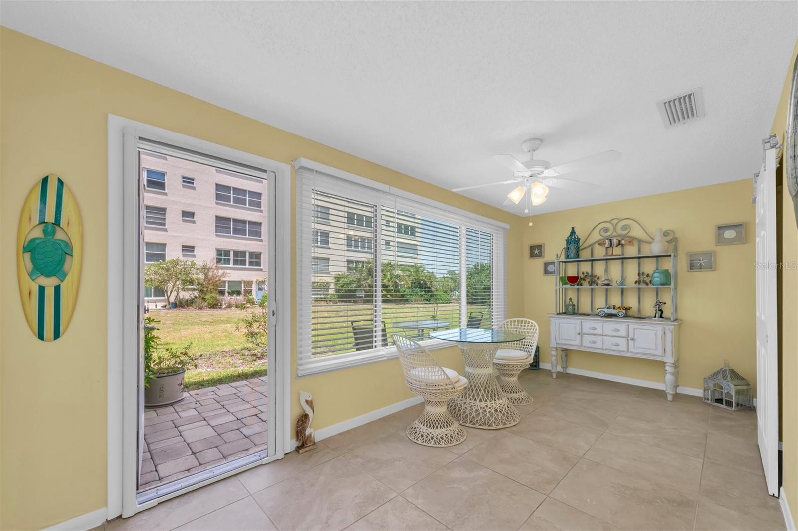 SCREEN DOOR LEADS TO YOUR PAVED PATIO