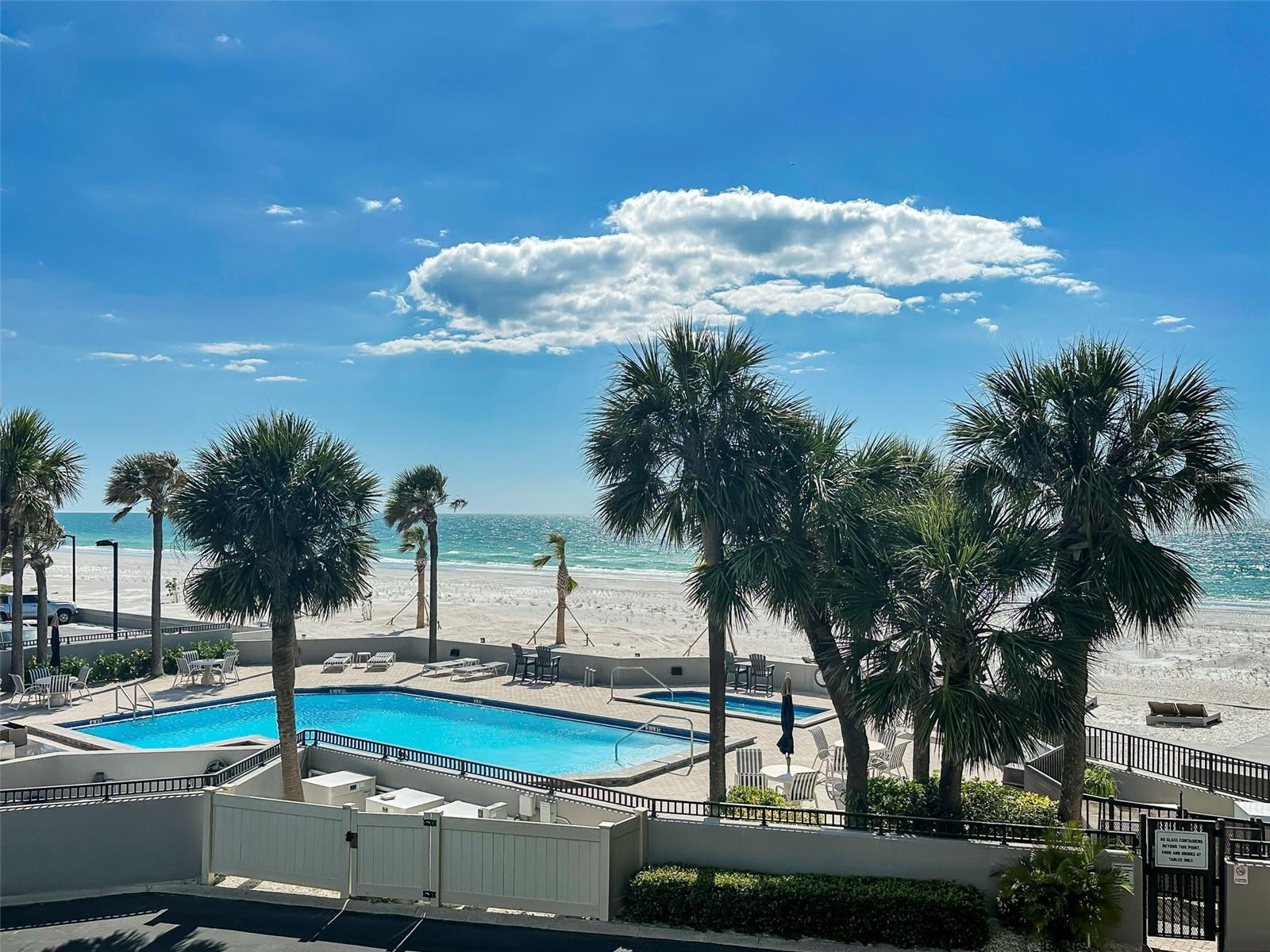 View of the Pool & the sugary sands of the Beach