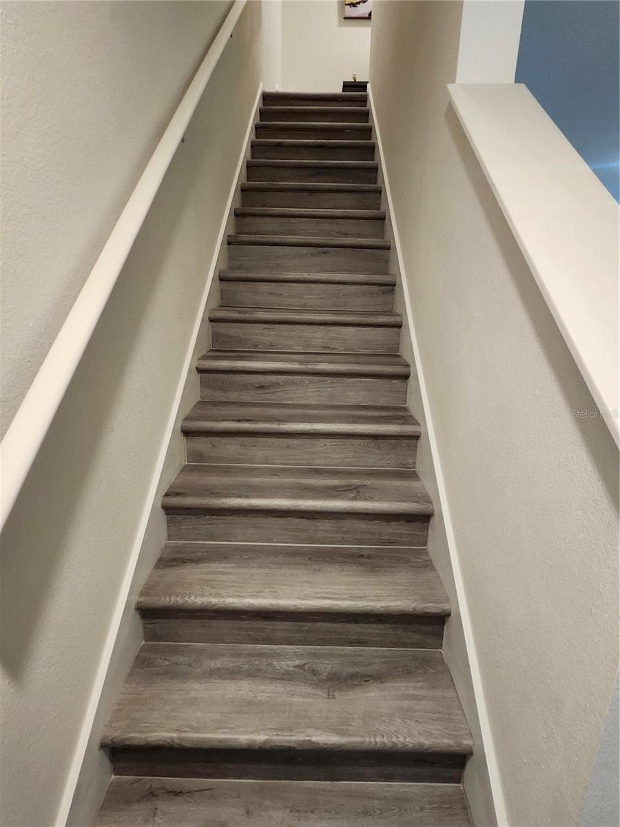 Brand New Luxury Vinyl flooring on stairs & upper level